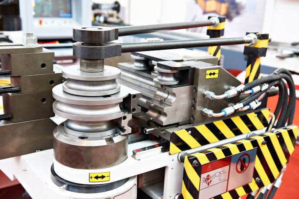 Machine for bending metal rods and pipes