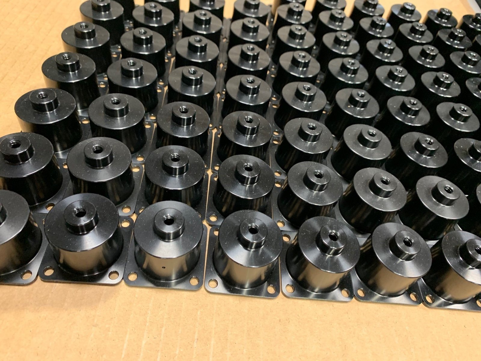 Finished black CNC machined steel components